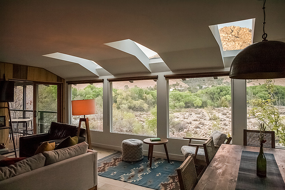 Modern rustic interior design and custom furniture for the Kern River House. Views of US Forest Service land and Sierra Nevada Mountains across the river from the Big View House.