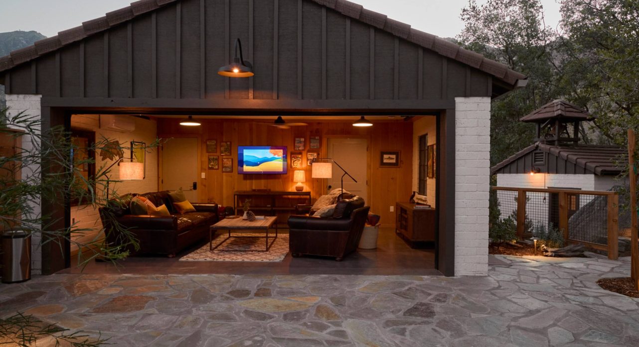 Cubhouse family space with TV & operable garage door.