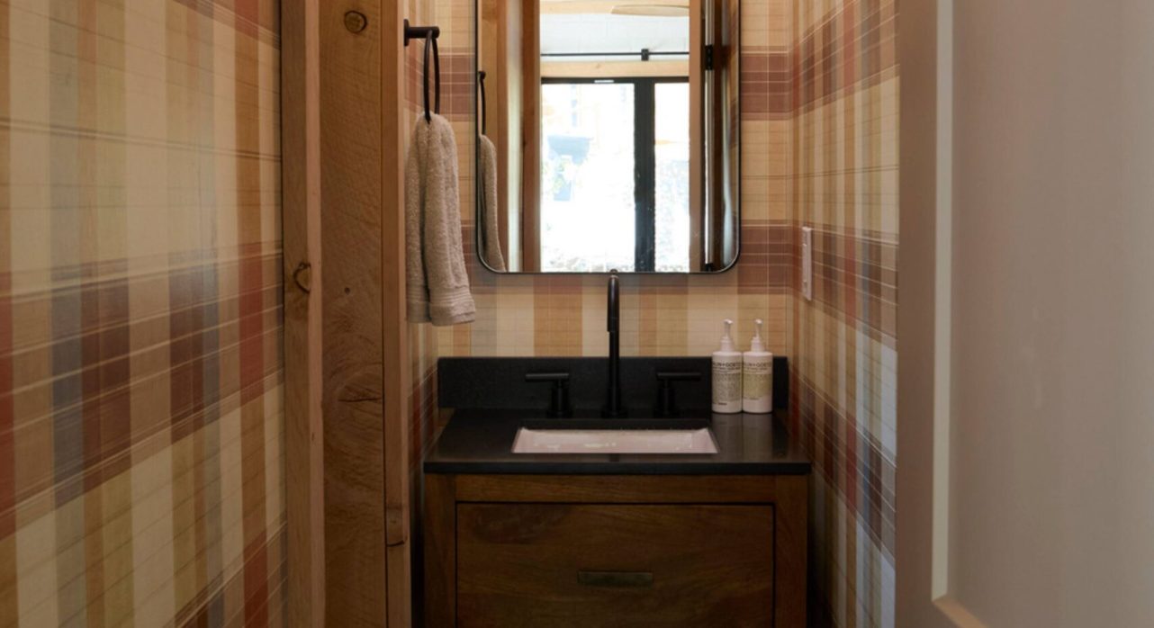 Guest Bathroom with Shower off Tukaway Cabin Living Room 2